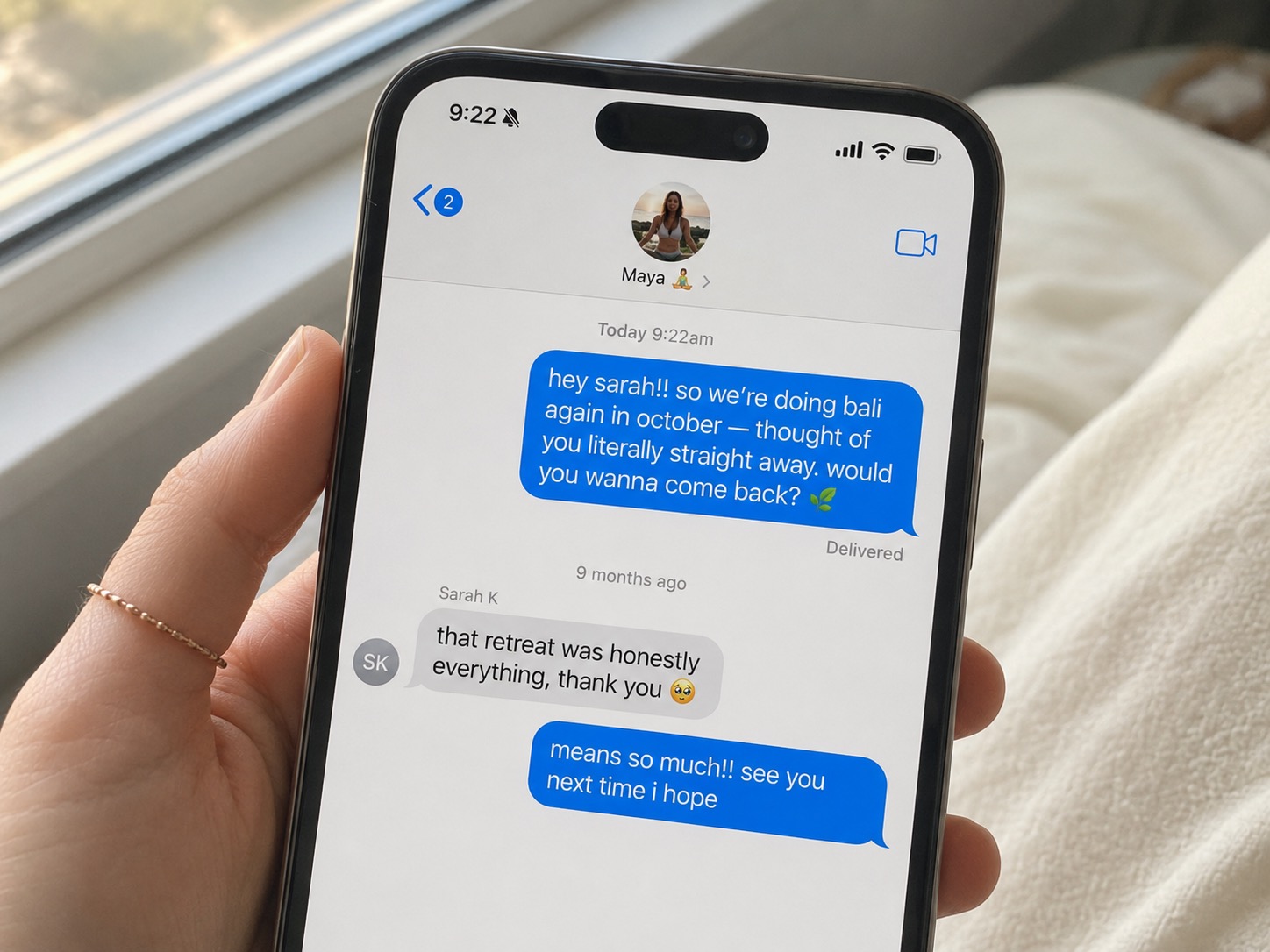 A yoga retreat guest receiving a personal follow-up text from their teacher